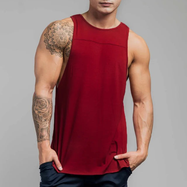 https://ae01.alicdn.com/kf/HTB1UJ.jasvrK1Rjy0Feq6ATmVXaf/Camiseta-esportiva-sem-mangas-masculina-para-corrida-academia-e-muscula-o.jpg_640x640.jpg